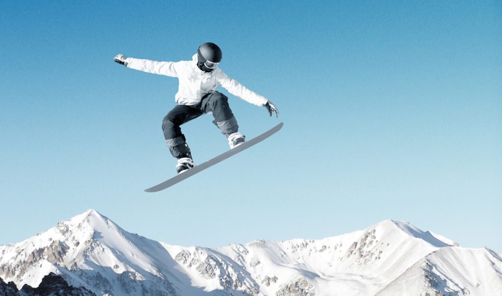 man snowboarding