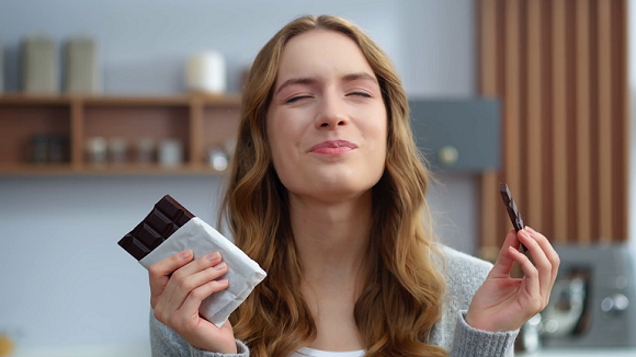woman enjoying chocolate 