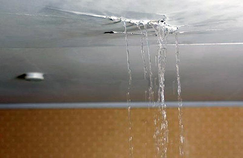 Roof leaking water damage