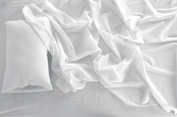 white sheets bed