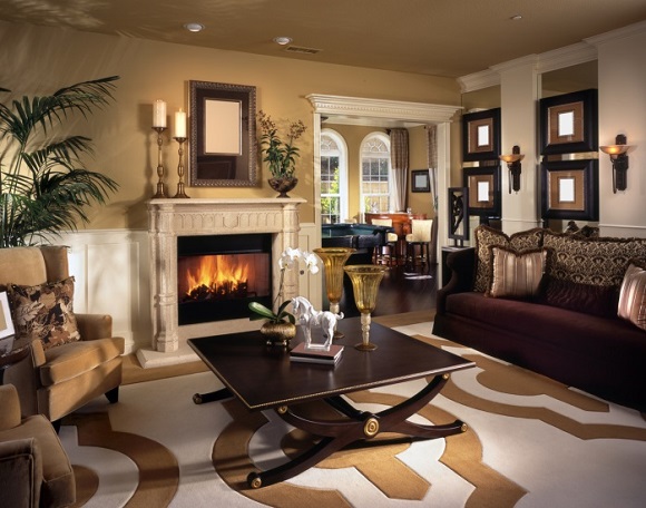 Well decorated living room with wall sconces 